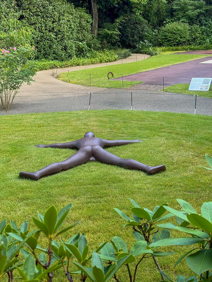The sculpture Close by Antony Gormley in the Hakone Open Air Museum at Kanagawa. Japan

Antony Gormely began making works like this one in the 1980’s, works which were meant to be shown in the open, by transferring his own flesh into sculpture. He modeled this work on his own body, and forged the sculpture out of 1 tonne of 1500℃ liquid iron, at that temperature, hot as the magma at the core of the Earth. Gormely says that the human body is a part of the Earth; one unit of nature. By stripping away any features or personality and leaving behind only a representation of naked, universal existence, he teaches us that the universe and humankind are one.