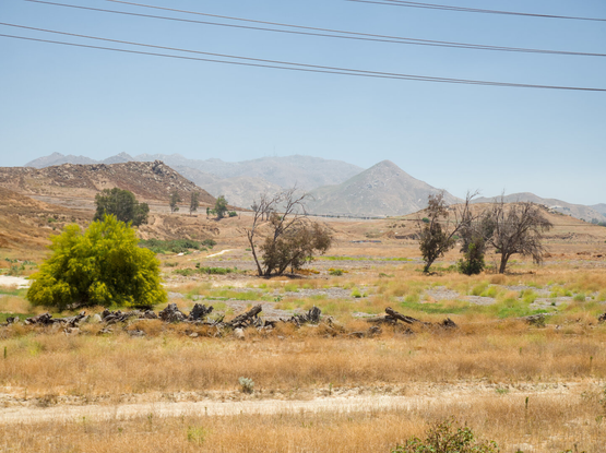 The arid landscape of hills by the Santa Ana River
