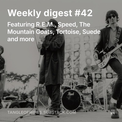 R.E.M. on stage playing live