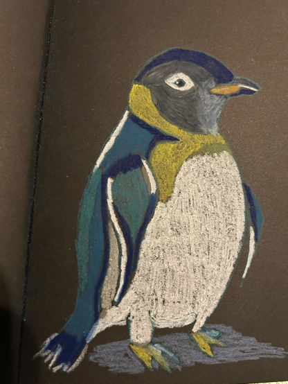 A penguin in pastel pencils on black paper
