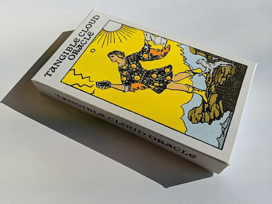 A handmade, riso printed card deck called the Tangible Cloud Oracle. On the box a modified tarot card originally called 'the fool' is shown. The card is now called 'Failing Again, Better': an adventurous person blindly follows their phone’s navigation and is about to walk into a ravine. There is hope though: an animal friend warns them and with the map in hand, they possess the knowledge and sense(s) to learn and find their way. 

If you have the time, failure can be an opportunity to learn more about a process and become closer to it. Sometimes it’s a shame when things just work. 