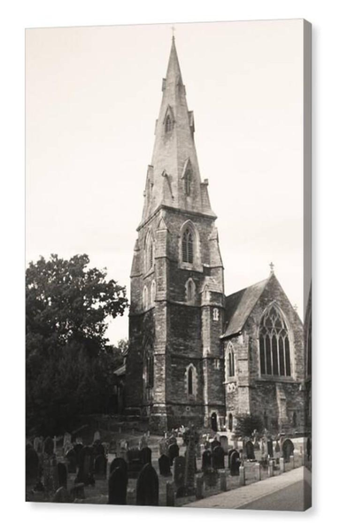 Black and white portrait film photograph of a Victorian church with a tall steeple.  The image is shown printed upon a box canvas.