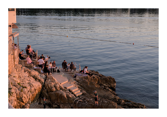 People gathering to look at sunset in Rovinj, Croatia