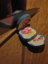 slicing through a simple 3d model of a cell with a regular kitchen knife