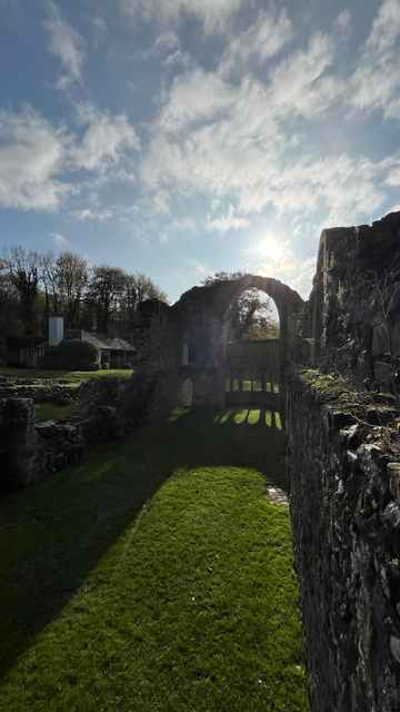 The interior of the Abbot's lodgings, viewed from the top of a staircase.