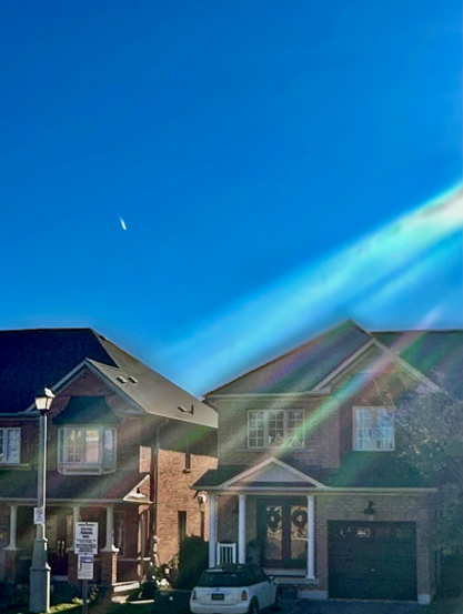 Contrail with a Light, a Blue Sky.