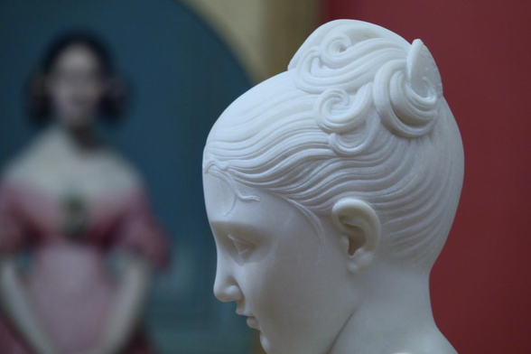 head of a sculpture of a young girl