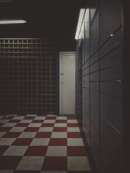 Night-time view of a room with a parcel pickup station in Cluj.