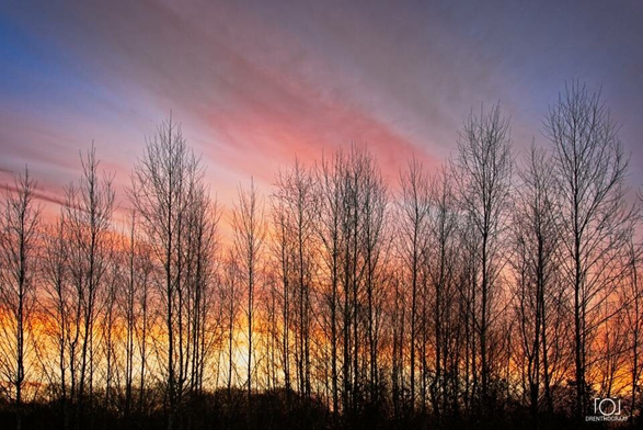 Same picture as before, only the sky is now in its original colors, witch are blue on top slowly turning into pink and yellowish. This image was taken by Drenthograaf.