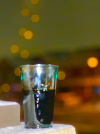 Wine with some lights-
a tree and a glass hole-
in snow ⛄️ 