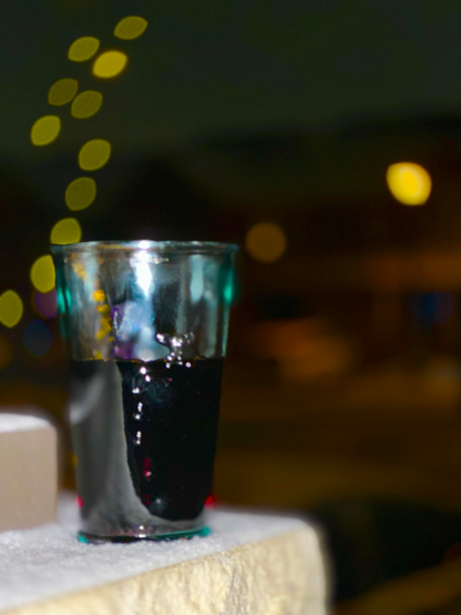 Wine with some lights-
a tree and a glass hole-
in snow ⛄️ 