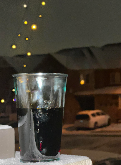 Wine with some lights-
a tree and a glass hole-
in snow ⛄️ 