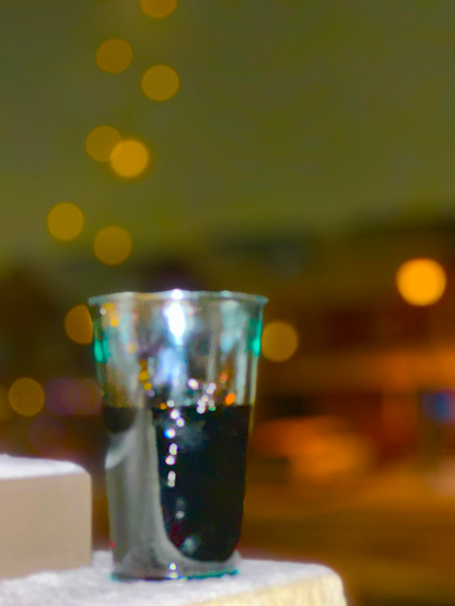 Wine with some lights-
a tree and a glass hole-
in snow ⛄️ 