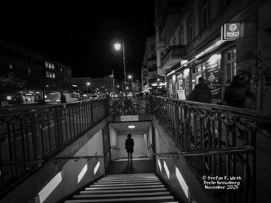 Entrance to an underground U-Bahn Station near Berlin Hermannplatz, an area partly belonging to Kreuzberg and partly to its neighbor district Neukölln, sometimes named "gate to Neukölln". November 2025, evening, © Stefan F. Wirth