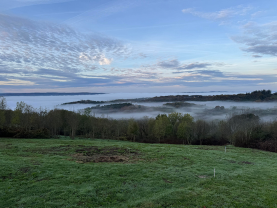Landscape view on the morning, hills ont the clouds