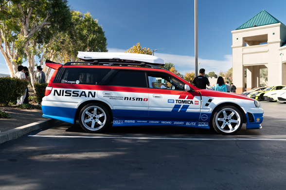 A Japanese station wagon done in Nissan/Nismo/Tomica racing livery.