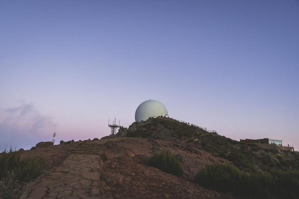 Astronomical observatory on the mountain, after sunset