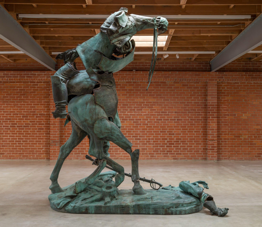 a bronze sculpture by Kara Walker made from reconfigured pieces of a former Confederate monument