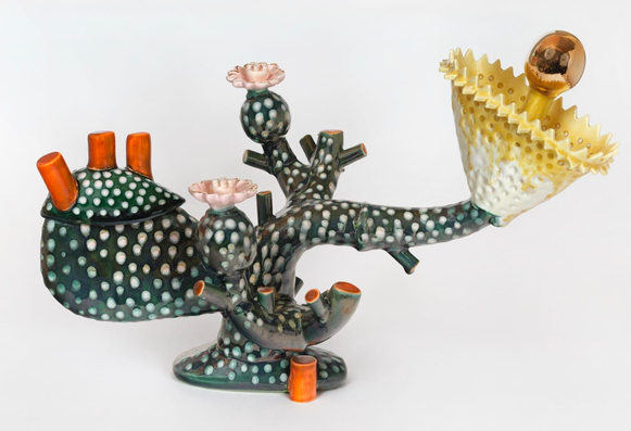 a ceramic sculpture by Megan Bogonovich resembling an abstract, otherworldly plant or flower
