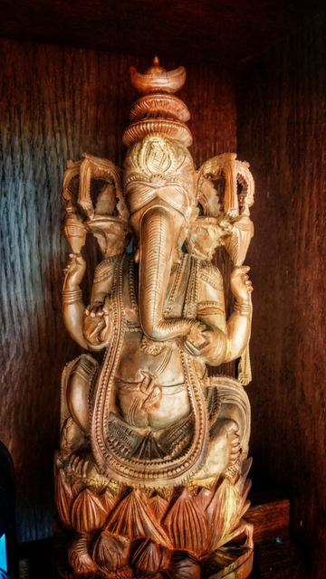 A wooden Ganesha statue