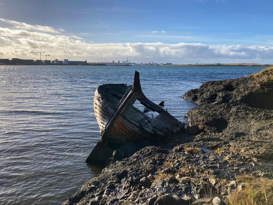 What remains of on old wooden boat that ran aground.