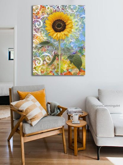 Sunflower and lace in a rainbow of colors in art on a wall in a furniture setting by artist Sharon Cummings.  Haiku in post.