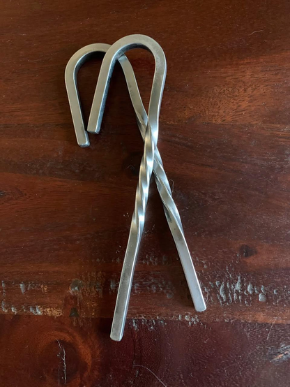 A pair of steel "candy canes."