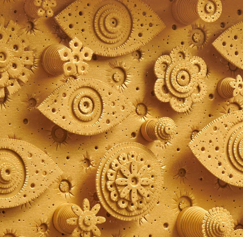 a detail of an artwork by Michael Velliquette made of numerous cut and glued shapes of yellow paper, featuring a number of tumbling eyes