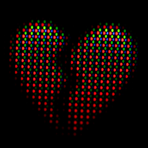 Extreme close-up macro photo of the subpixels (Red, Green, Blue dots) on an OLED display showing a broken heart emoji.