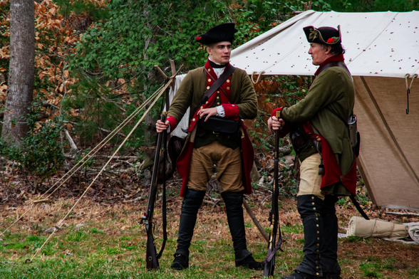 A photo of two German Hessian reenactors at the anniversary of the "Battle Of Guilford Courthouse" during the American Revolutionary War. 