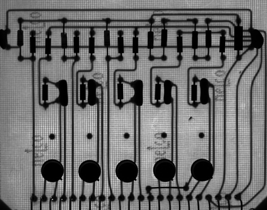 Silhouette of a computer circuit board from the 60s.
