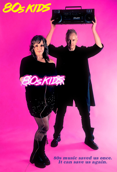 This is a poster for 80s kids. Jamie and Shannon are dressed in all black against a bright pink background. Jamie is holding a boombox over his head like John Cusack in the movie Say Anything, and Shannon is standing just in front of him holding a pink neon sign that says 80s kids. There is a quote at the bottom that read, "80s music saved us once. It can save us again."