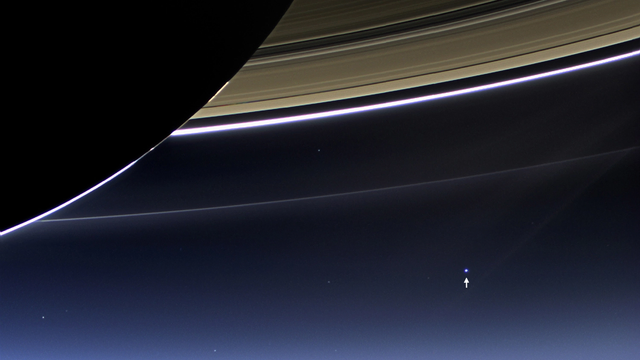 This rare image taken on July 19, 2013, by NASA's Cassini spacecraft has shows Saturn's rings and our planet Earth and its moon in the same frame. At the time, Cassini was 2013 from a distance of about 898.414 million miles (1.445858 billion kilometers) from Earth. It is only one footprint in a mosaic of 33 footprints covering the entire Saturn ring system (including Saturn itself) taken by Cassini's wide-angle camera. (Image credit: NASA/JPL-Caltech/Space Science Institute)