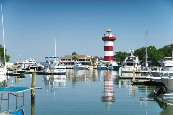 Boats Lighthouse Reflections Harbour Town Marina Hilton Head South Carolina

Harbour Town Marina is a popular destination located in Hilton Head Island, South Carolina. Situated within the Sea Pines Resort, it's known for its picturesque views, upscale shops, restaurants, and various recreational activities.

Here are some highlights and features of Harbour Town Marina:

Scenic Views: The marina offers stunning views of the Calibogue Sound, making it a picturesque spot for visitors to enjoy.

Boating and Water Activities: Harbour Town Marina provides facilities for boating enthusiasts, including boat rentals, charters, and boat slips. Visitors can indulge in activities such as fishing, sailing, and kayaking.

Harbour Town Lighthouse: One of the most iconic landmarks in the area is the Harbour Town Lighthouse, which stands tall overlooking the marina. Visitors can climb to the top for panoramic views of the surrounding area.

Shopping and Dining: The marina features a range of boutique shops, galleries, and restaurants offering a variety of cuisines, from casual fare to fine dining experiences.

Image:
https://fineartamerica.com/featured/boats-lighthouse-reflections-harbour-town-marina-hilton-head-south-carolina-wayne-moran.html

Read more: https://waynemoranphotography.com/blog/hilton-head-island-timeless-charms/

#HiltonHead #SouthCarolina #Harbor #Ocean #Boats #nature #travelPHotogrpahy #Landscape #art #fineart 

#ayearforart #buyintoart