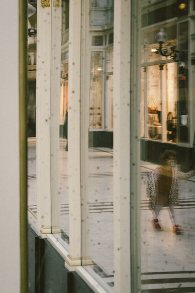 Picture of a child in a reflection of a reflection