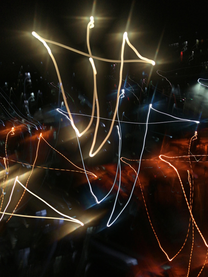 Photo taken with filter light painting (light graffiti) which you can move your camera in any direction to get shot like this.