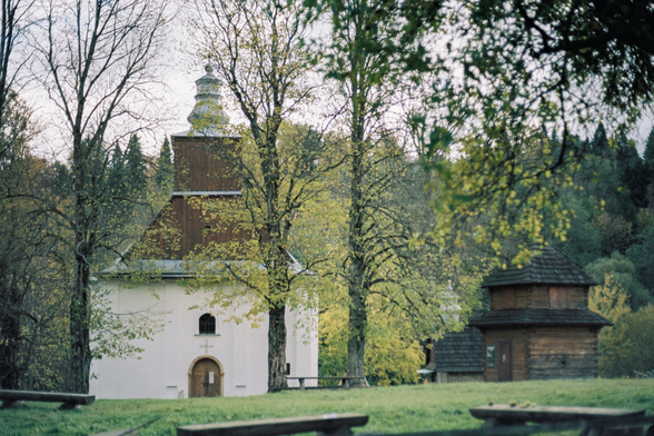 An old Orthodox church and a temple in the forest.