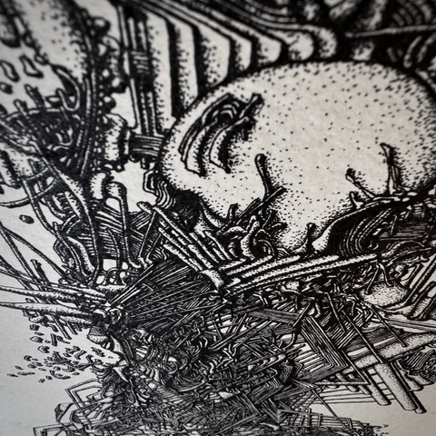 A zoomed in shot of the artwork. A circular form surrounded and enveloped by chaotic patterns.