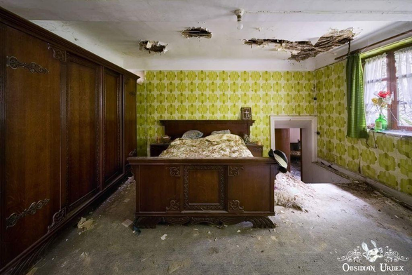 bedroom with wooden double bed