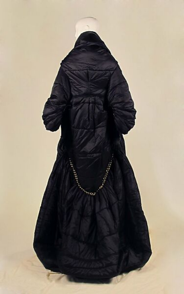 the jacket from the back, it is big and billowy 