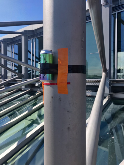 A #SolarCan pinhole camera attached to a girder on the top of the Baltic. Tape is used to hold it firm and keep it from being stolen by birds!