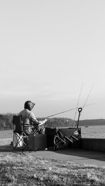 Old Hollow Lake Fisherman, enjoying his day, catching some fish.
(this is the best photo I've ever taken)