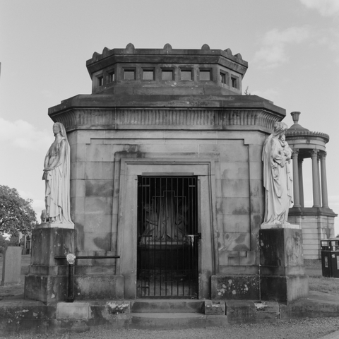 Yashica MAT124G | Kodak Tri-X 400 | Shot at 320 + Med Yellow Filter | Developed in XTOL

A mausoleum of some sort - angels flanking the door