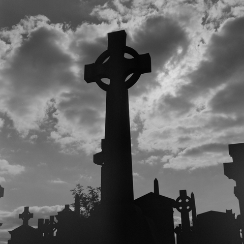 Yashica MAT124G | Kodak Tri-X 400 | Shot at 320 + Med Yellow Filter | Developed in XTOL

A Celtic (I think? Please correct me if I am mistaken) cross, dark, with a cloudy sky in the background