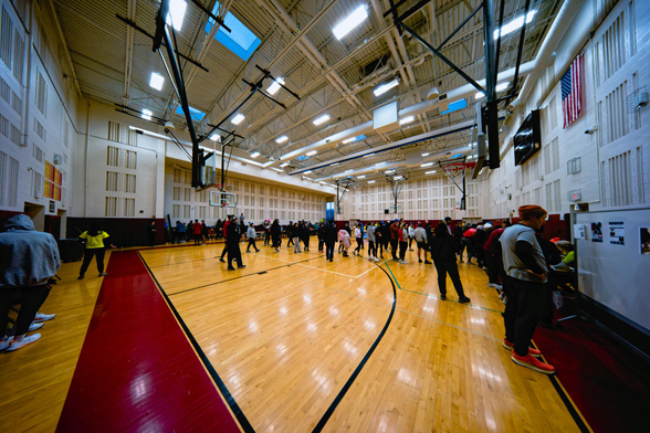Wide angle view from the corner of a high school gym with dramatic angles