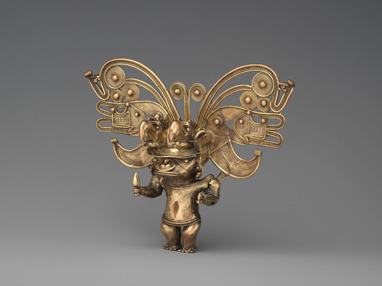 Gold figure pendant
Gold, 13.7 x 16.8 x 5.1 cm, Tairona artist, between 900–1600
The Metropolitan Museum of Art
A chieftain from Colombia is depicted with an elaborate, flamboyant headdress.