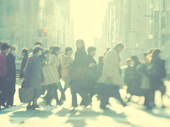 Standing on the Ginza Crossing looking due south. People crossing in the winter light. A specific plane of focus set with movements of the lens plane creates the effect. 

From a series I made back in 2011, called "Ghosts of Ginza". Shot with a Mamiya AFDii medium format camera, ZD digital back, 127mm Kodak lens from 1943 and a macro bellows converted into shooting infinity focus with tilt, shift and swing movements. 