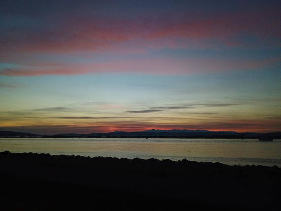 The light setting over the Olympics.
Striking blues and reds reflected off the clouds.