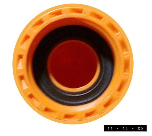 Orange-yellow connection to a standard garden hose found opposite the top nozzly part of a 32 oz. bottle of Spectracide Weed Stop.  Water from the hose mixes with the herbicide in the bottle and is sprayed out over the lawn to kill 250 different weeds (including crabgrass).  I apply it just once a year to maybe half my lawn.  I hate it.  I just don't have the killer instinct necessary to pull this off with any pleasure or grace.  But all my friends and neighbors refused to adopt my weeds despite being asked repeatedly!  The "Free Weeds" ad I put in my local newspaper and posted online drew NO response.  My county doesn't have a no-kill weed shelter.  An armed park ranger stopped me when I tried to release my weeds back into the wild at a local park.  I really, REALLY didn't want to have to kill them.  But my society left me no choice.  If the dandelion ever goes extinct, blame me.  Until then, I'll be trying to redeem myself by serving as a foster parent to a wilted bag of lettuce I rescued from my grocery store's dumpster.      