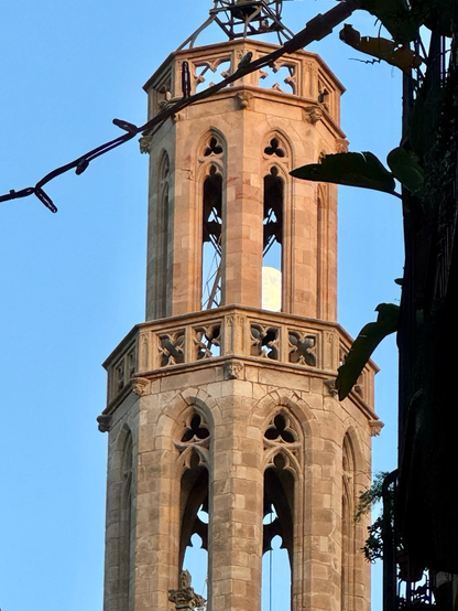 The moon as seen through the openings in the tower of Santa Maria del Mar 